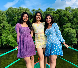 Friends enjoying a thrilling group Boat Ride with RV Boating Adventure in Pondicherry, surrounded by scenic waterways.